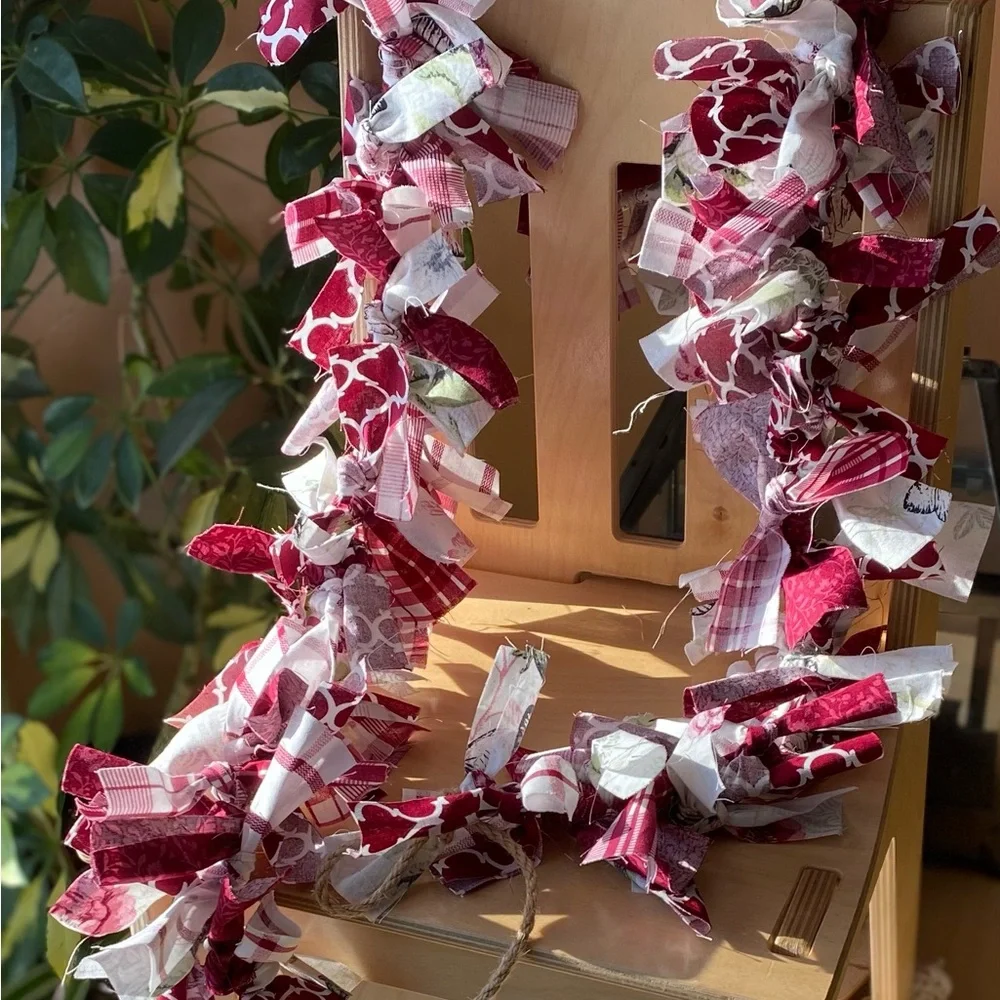Primitive Red and White fabric garland with splashes of pink, green and black
